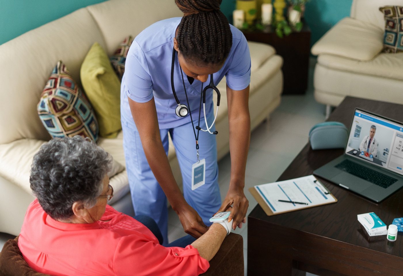 Nurse checking on a client during a home visit
